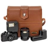 Pentax auto 110 with 2,8/20-40 mm Zoom and Accessories, c. 1979
